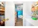 Main bathroom with a large corner bathtub, toilet, and vanity with a sink at 4307 Meadow Ridge Ct, Mulberry, FL 33860