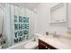 Bathroom with shower/tub combo and vanity at 4307 Meadow Ridge Ct, Mulberry, FL 33860