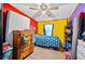 Bedroom with wooden dresser and ceiling fan at 4307 Meadow Ridge Ct, Mulberry, FL 33860