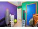 Bedroom with colorful walls and storage at 4307 Meadow Ridge Ct, Mulberry, FL 33860