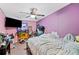 Bedroom with double bed, TV, and dresser at 4307 Meadow Ridge Ct, Mulberry, FL 33860