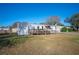 Single-wide manufactured home with ramp access at 4307 Meadow Ridge Ct, Mulberry, FL 33860
