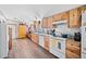 Spacious kitchen with light wood cabinets, granite countertops, and modern appliances at 4307 Meadow Ridge Ct, Mulberry, FL 33860