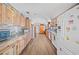 Spacious kitchen with ample cabinetry and wood flooring at 4307 Meadow Ridge Ct, Mulberry, FL 33860