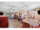 Open living space with dining area and hardwood floors at 4307 Meadow Ridge Ct, Mulberry, FL 33860