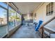 Screened porch with storage and yard view at 4307 Meadow Ridge Ct, Mulberry, FL 33860