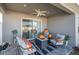 Relaxing covered patio featuring comfortable seating and fire pit at 4340 Reding Way, Lakeland, FL 33813