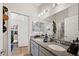 Bathroom with double vanity and view of ' room at 4340 Reding Way, Lakeland, FL 33813