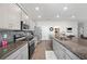 Modern kitchen with stainless steel appliances and granite countertops at 4340 Reding Way, Lakeland, FL 33813