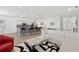 Open concept kitchen and living room with stainless steel appliances and modern furniture at 4340 Reding Way, Lakeland, FL 33813