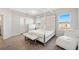 Spacious main bedroom with large bed and modern furniture at 4340 Reding Way, Lakeland, FL 33813