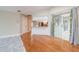 Living room with hardwood floors and a view of the kitchen at 5545 Harrells Nursery Rd, Lakeland, FL 33812