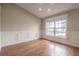 Spacious office with hardwood floors and a large window at 5545 Harrells Nursery Rd, Lakeland, FL 33812