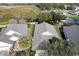 Aerial view of two homes with grey roofs at 731 Lake Clark Ct, Lakeland, FL 33813