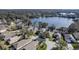 Lakeside community with various homes, aerial view at 731 Lake Clark Ct, Lakeland, FL 33813