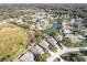 Aerial view of neighborhood with lake at 731 Lake Clark Ct, Lakeland, FL 33813