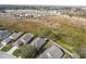 Aerial view of homes near a main road at 731 Lake Clark Ct, Lakeland, FL 33813