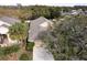 Aerial view of single-Gathering home with grey roof at 731 Lake Clark Ct, Lakeland, FL 33813