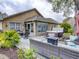 Backyard patio with hot tub, seating area, and fire pit at 731 Lake Clark Ct, Lakeland, FL 33813