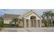 Inviting community building with stone accents and landscaping at 731 Lake Clark Ct, Lakeland, FL 33813