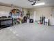 Spacious garage with ample storage shelving and workbench at 731 Lake Clark Ct, Lakeland, FL 33813