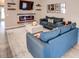 Cozy living room featuring a fireplace and comfortable seating at 731 Lake Clark Ct, Lakeland, FL 33813