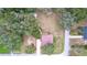 Home nestled amongst lush greenery and trees at 7405 Havenwood Dr, Lakeland, FL 33810