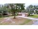 House with a large backyard and long driveway at 7405 Havenwood Dr, Lakeland, FL 33810