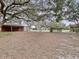 Large backyard with mature trees and open space at 7405 Havenwood Dr, Lakeland, FL 33810