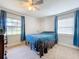 Cozy bedroom with window and ceiling fan at 7405 Havenwood Dr, Lakeland, FL 33810