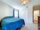 Bright bedroom with double closet and ceiling fan at 7405 Havenwood Dr, Lakeland, FL 33810