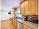 Bright kitchen with stainless steel appliances and wood flooring at 7405 Havenwood Dr, Lakeland, FL 33810