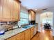 Modern kitchen featuring granite countertops and ample cabinetry at 7405 Havenwood Dr, Lakeland, FL 33810