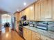 Spacious kitchen with granite countertops and stainless steel appliances at 7405 Havenwood Dr, Lakeland, FL 33810