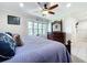 Main bedroom with large bed, dresser, and bay window at 7405 Havenwood Dr, Lakeland, FL 33810