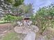 Stone patio with seating area and grill at 7405 Havenwood Dr, Lakeland, FL 33810