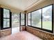 Screened porch overlooking backyard at 7405 Havenwood Dr, Lakeland, FL 33810