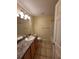 Bathroom with a vanity, toilet, and bathtub at 8052 Sugar Pine Blvd, Lakeland, FL 33810