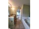 Double vanity bathroom with bathtub at 8052 Sugar Pine Blvd, Lakeland, FL 33810