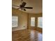 Bright bedroom with hardwood floors and large windows at 8052 Sugar Pine Blvd, Lakeland, FL 33810