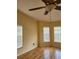 Spacious bedroom with hardwood floors and large windows at 8052 Sugar Pine Blvd, Lakeland, FL 33810