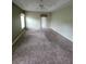 Bright bedroom with door leading outside at 8052 Sugar Pine Blvd, Lakeland, FL 33810