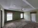 Bright bedroom with two windows and ceiling fan at 8052 Sugar Pine Blvd, Lakeland, FL 33810