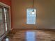 Dining room with hardwood floors and access to backyard at 8052 Sugar Pine Blvd, Lakeland, FL 33810