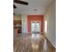 Open dining area with hardwood floors and access to patio at 8052 Sugar Pine Blvd, Lakeland, FL 33810