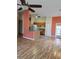 Open kitchen with wood cabinets and breakfast bar at 8052 Sugar Pine Blvd, Lakeland, FL 33810