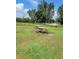 Wooden picnic tables in a grassy park-like setting at 8052 Sugar Pine Blvd, Lakeland, FL 33810