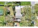 Aerial view showcasing the home's lot and surrounding landscape at 1118 Cypress W Pt, Winter Haven, FL 33884