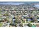 Wide aerial view showing the property's location near the lake at 1118 Cypress W Pt, Winter Haven, FL 33884