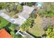 Aerial view showing house, driveway, and expansive backyard at 1118 Cypress W Pt, Winter Haven, FL 33884